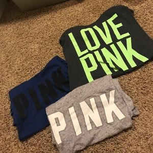 assortment of PINK t-shirts